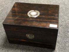 A 19th century coromandel mother of pearl inlaid vanity box containing silver plated glass jars and