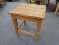 A 20th century pine square occasional table