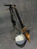 A vintage Electrolux floor buffer together with an Alko electric hedge trimmer (no lead)
