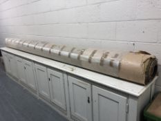 A roll of brown carpet, 3.