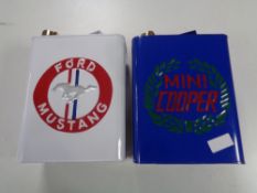 Two reproduction metal petrol cans,