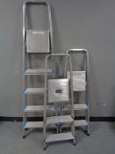 Three sets of aluminium steps