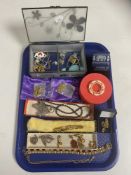 A tray of assorted costume jewellery, 9ct gold rope chain, gold earring, silver brooch,
