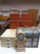 A storage box depicting map of the world together with two further sets of three graduated storage