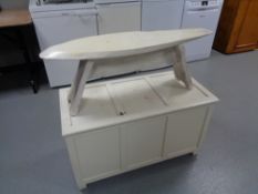 A painted rustic bench and a painted oak blanket box