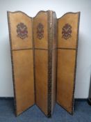 An early 20th century four fold faux leather screen