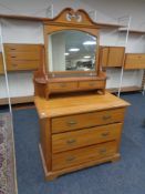 An Edwardian satin walnut dressing chest