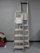 Two sets of aluminium folding steps