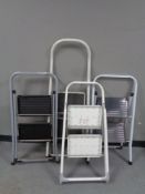 Four sets of folding stool steps