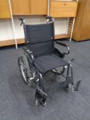 A folding Karma wheel chair