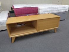 A contemporary oak entertainment stand