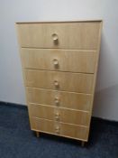 A mid 20th century six drawer chest