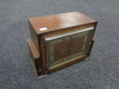 An oak cased Art Deco Coronet mantel clock