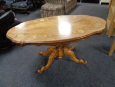 An Italian style coffee table on four way pedestal