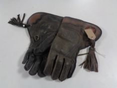 A pair of vintage leather falconry gauntlets