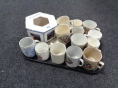 A tray of china, commemorative beakers,