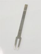 A cast solid sliver copy of a 17th century fork dated 1632,