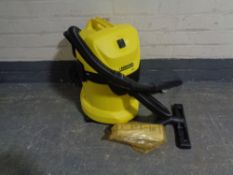 A Karcher WD3 cylinder vacuum