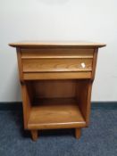 A Krug teak side table,