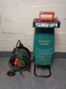 A Bosch AXT rapid 2200 garden shredder,