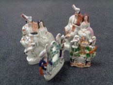 Four Staffordshire flat backed figures