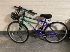 A Magna mountain bike with helmet