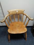An early twentieth century beech captain's armchair