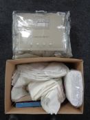 A box containing a quantity of vintage bedding together with a king size bed comforter