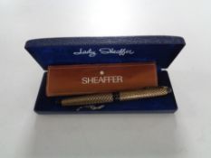 A cased Lady Sheaffer fountain pen with 14ct gold nib