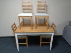 An Ikea pine top dining table on painted legs,