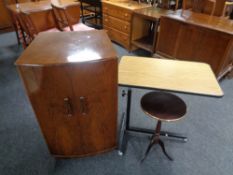 A 1930s walnut double door record cabinet,