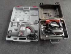 A cased Skil circular saw together with a cased Performance multipurpose saw