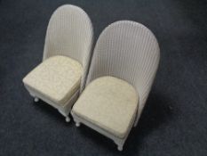 A pair of painted loom bedroom chairs
