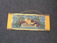 A Soupe Paysanne advertisement on a pine board