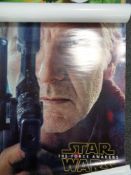 A box containing rolled posters to include Star Wars, Zelda,