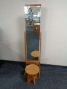 A mid twentieth century teak cheval mirror,
