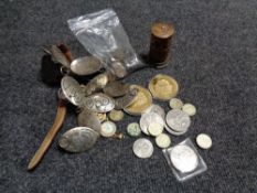 A crate containing commemorative coins and other coins, wrist watch, panel necklace,