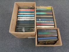 Three boxes containing LP box sets,
