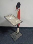 A 1930's hand painted wooden dumb waiter with tray