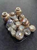 A tray containing a pair of Japanese Satsuma vases together with a quantity of Japanese egg shell