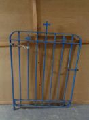 A wrought iron ecclesiastical gate