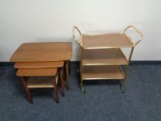 A nest of three twentieth century teak tables,