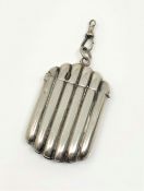 An antique silver vesta case.