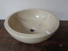 A marble hand basin.
