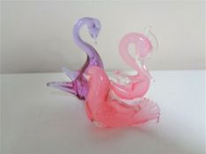 Three Murano glass bird ornaments.