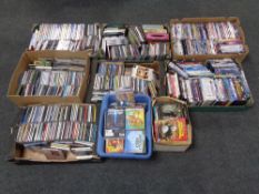Nine boxes and crates containing assorted DVDs and CDs.