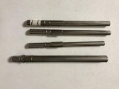 Four vintage thermometers in case.