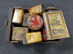 A box of assorted vintage tins