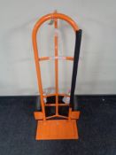 A heavy duty sack barrow with spring loaded axle