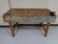 A 20th century workbench fitted with a vice